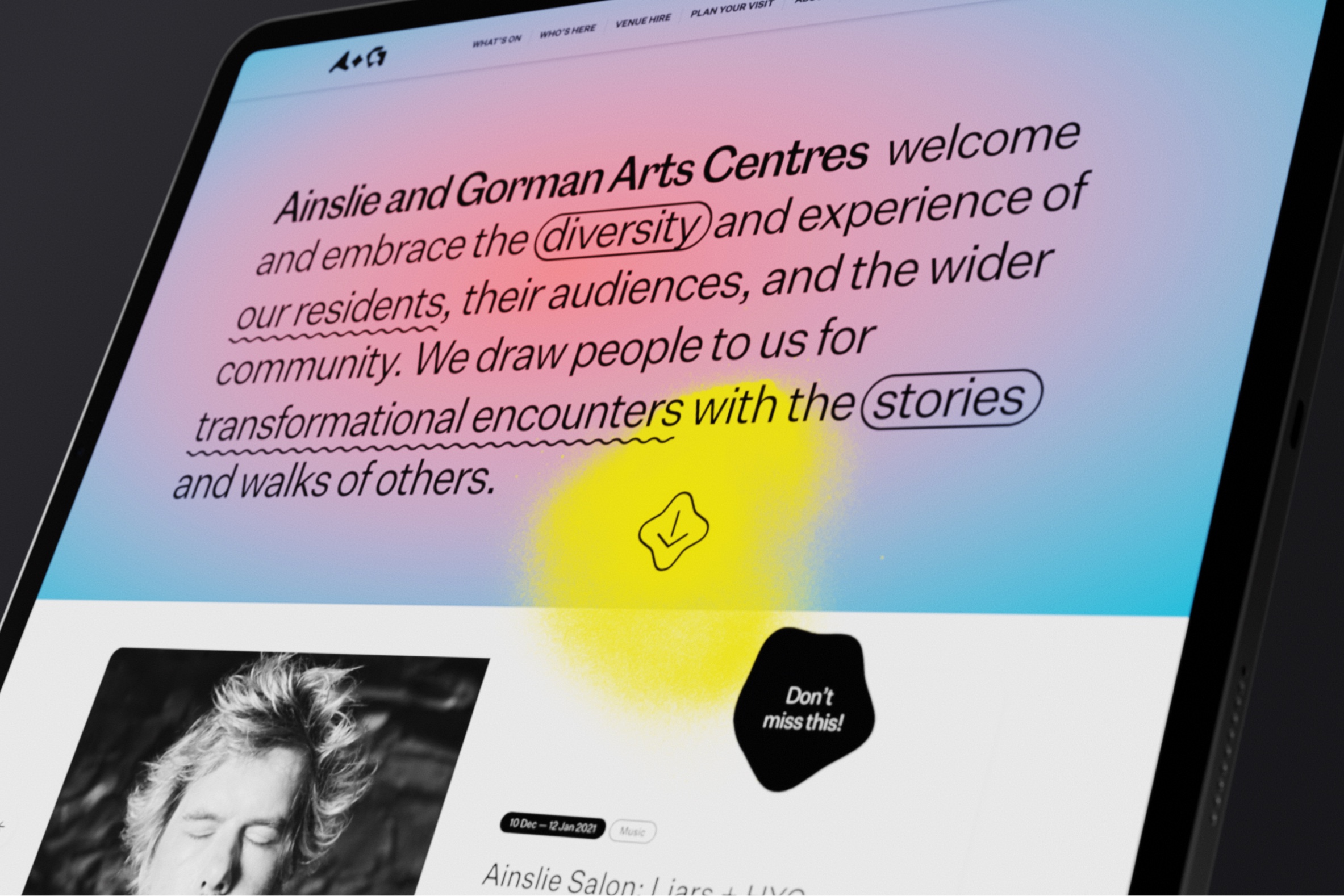 An iPad displaying the homepage of the Ainslie and Gorman Arts Centres website.